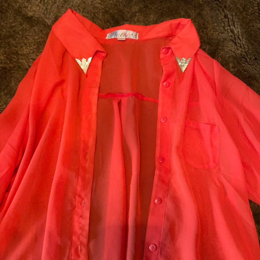Coral button down sheer blouse with chic gold colored detail